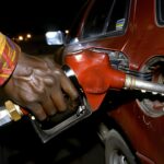 person-hand-pumping-gasoline-fuel-fueling-car-gas-station-fuel-station-service-fill-energy